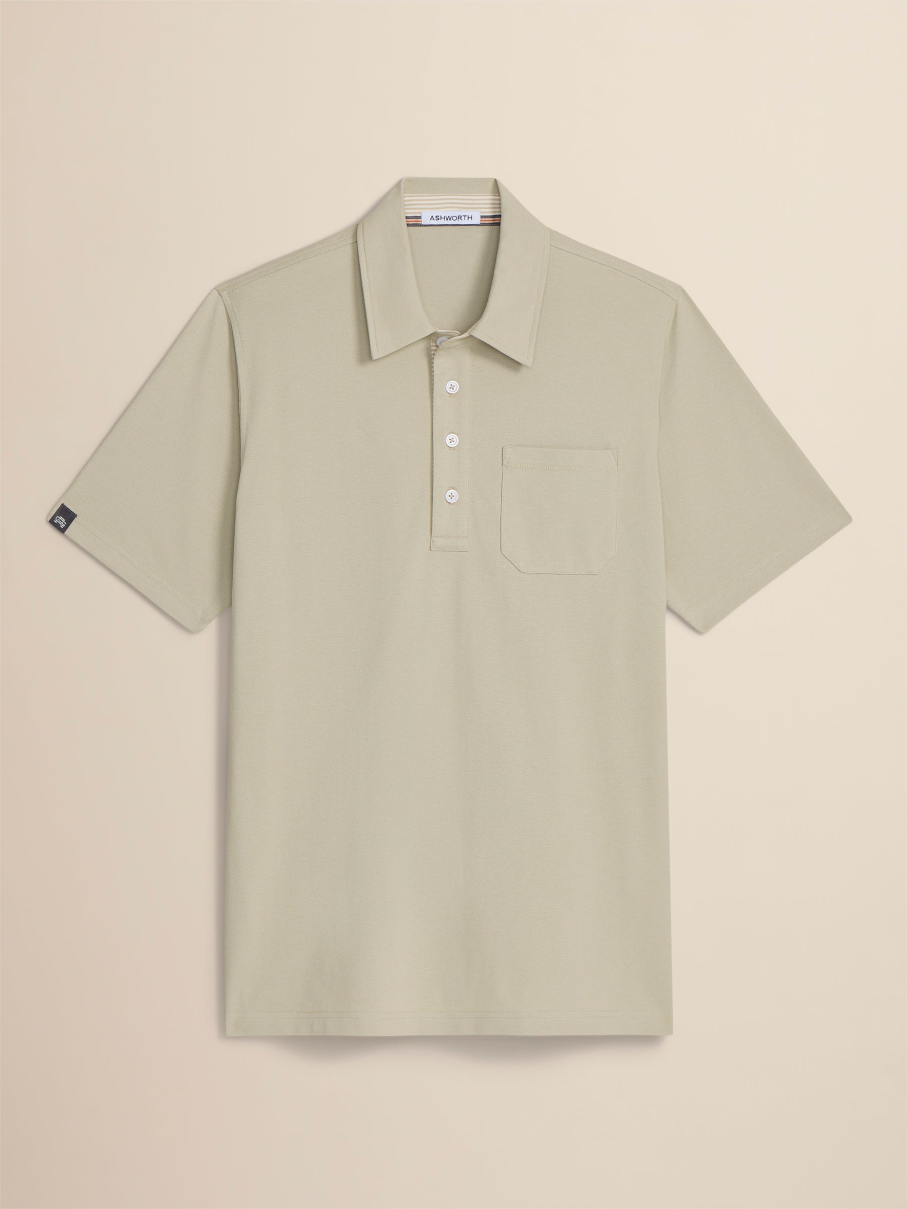 Beige short-sleeve polo shirt on a beige background