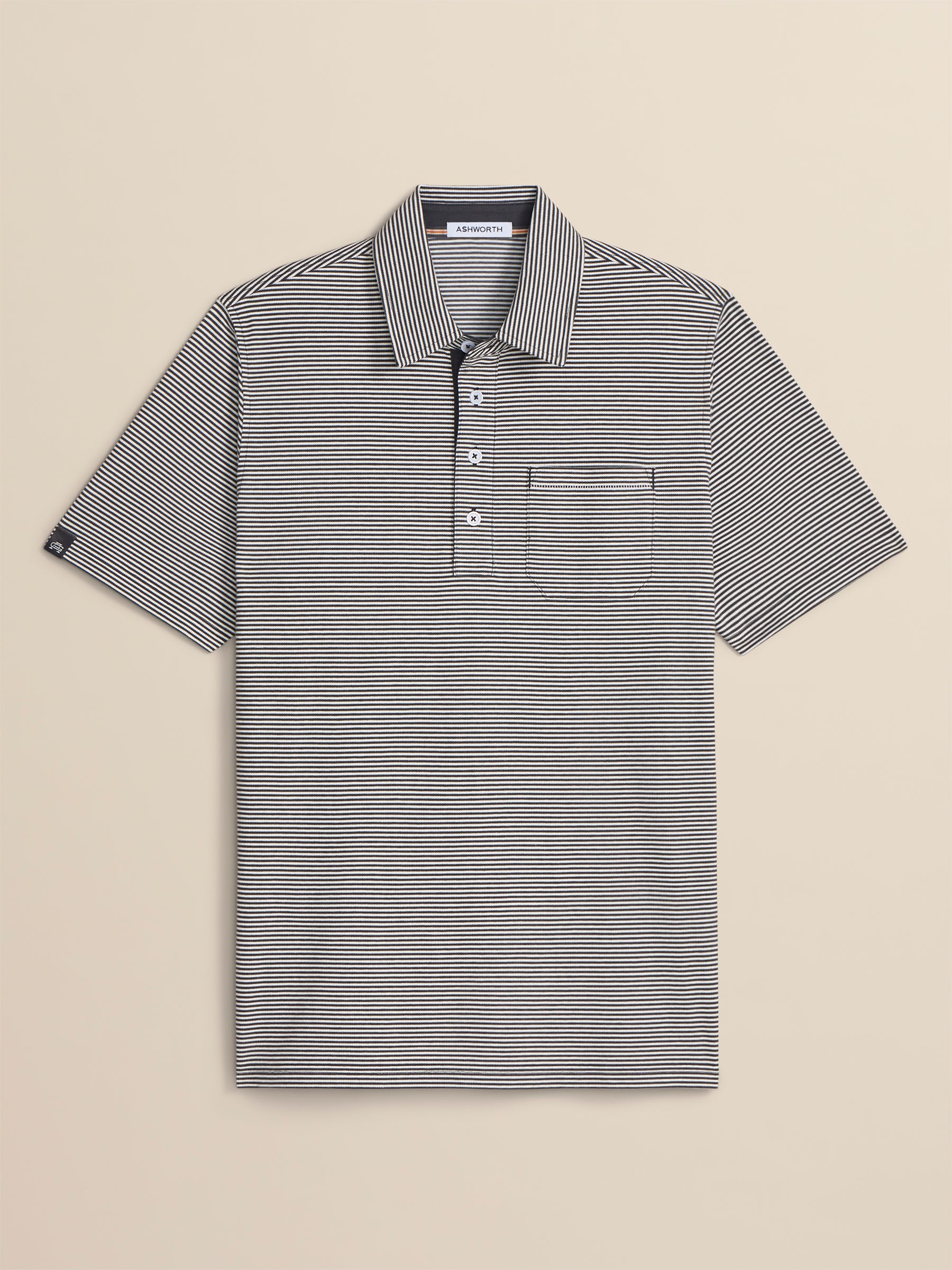 Striped polo shirt on a beige background