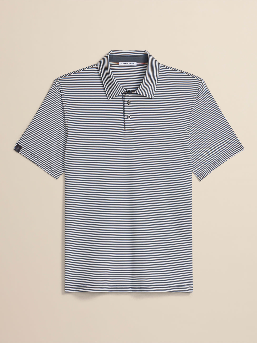 Striped polo shirt on a beige background