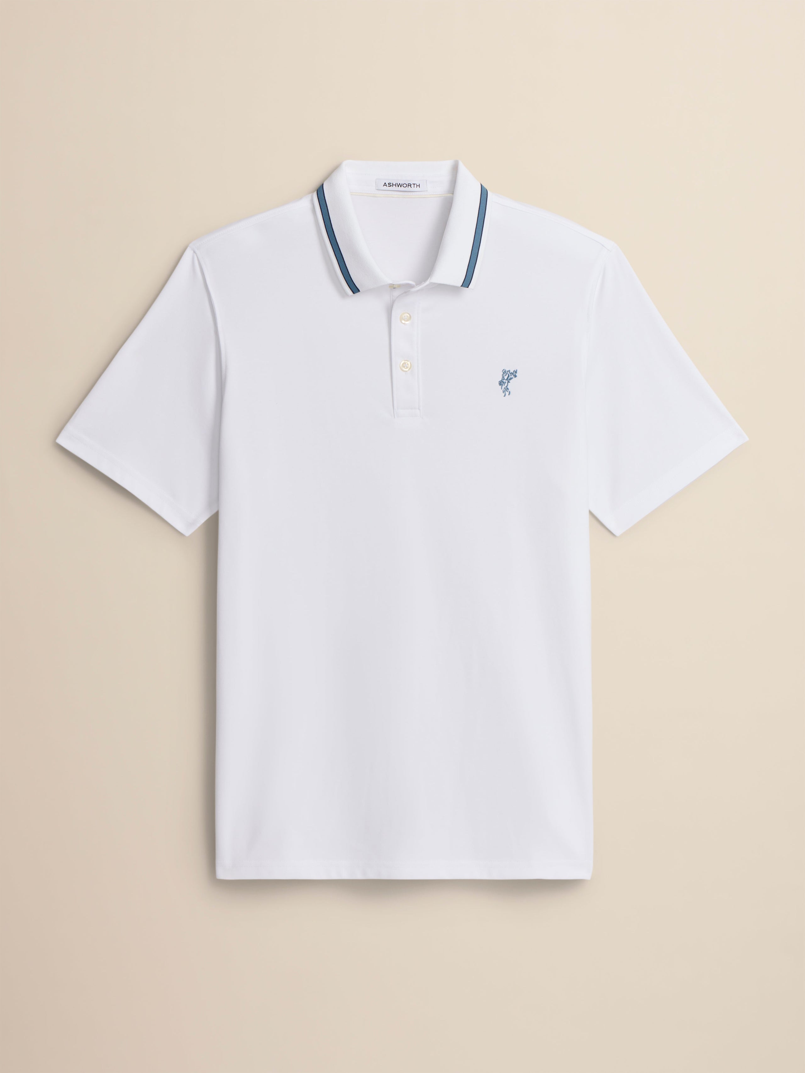 White polo shirt with blue trim on a beige background