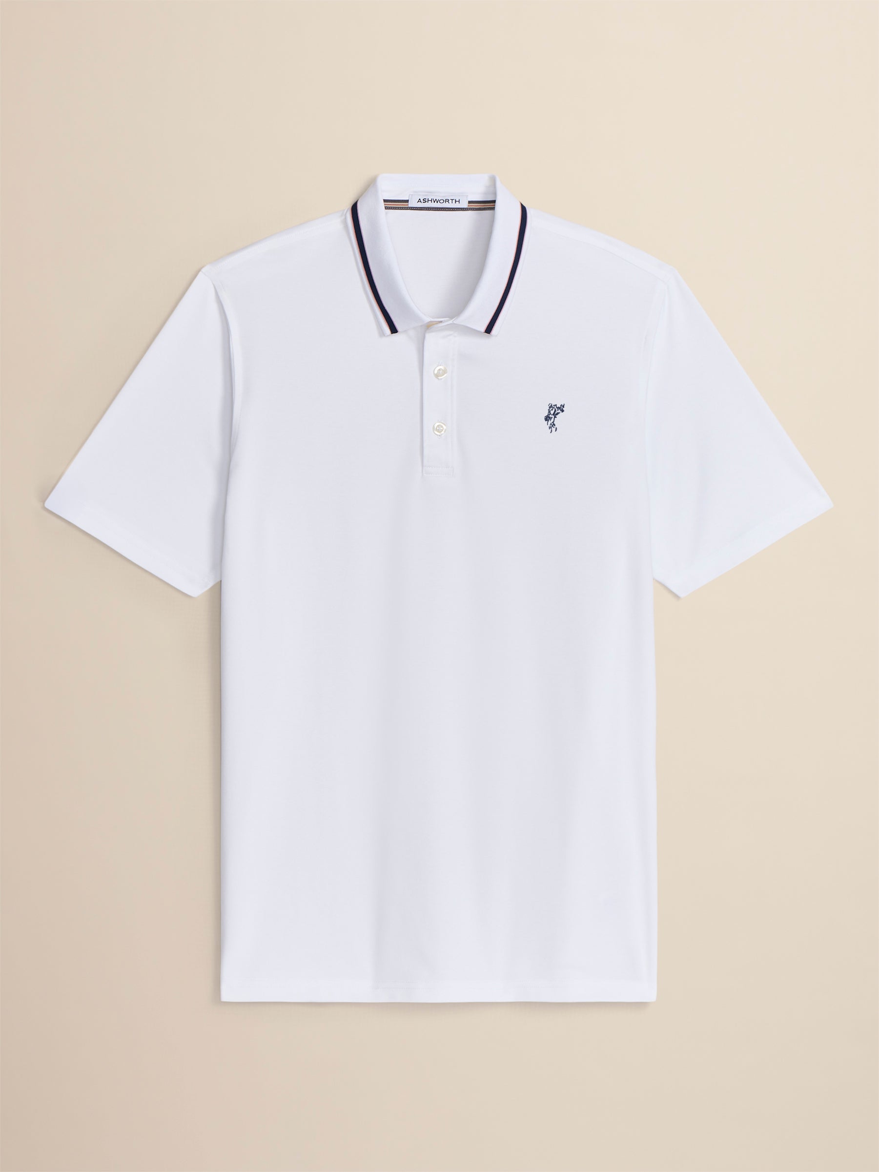 White polo shirt with black trim on a beige background