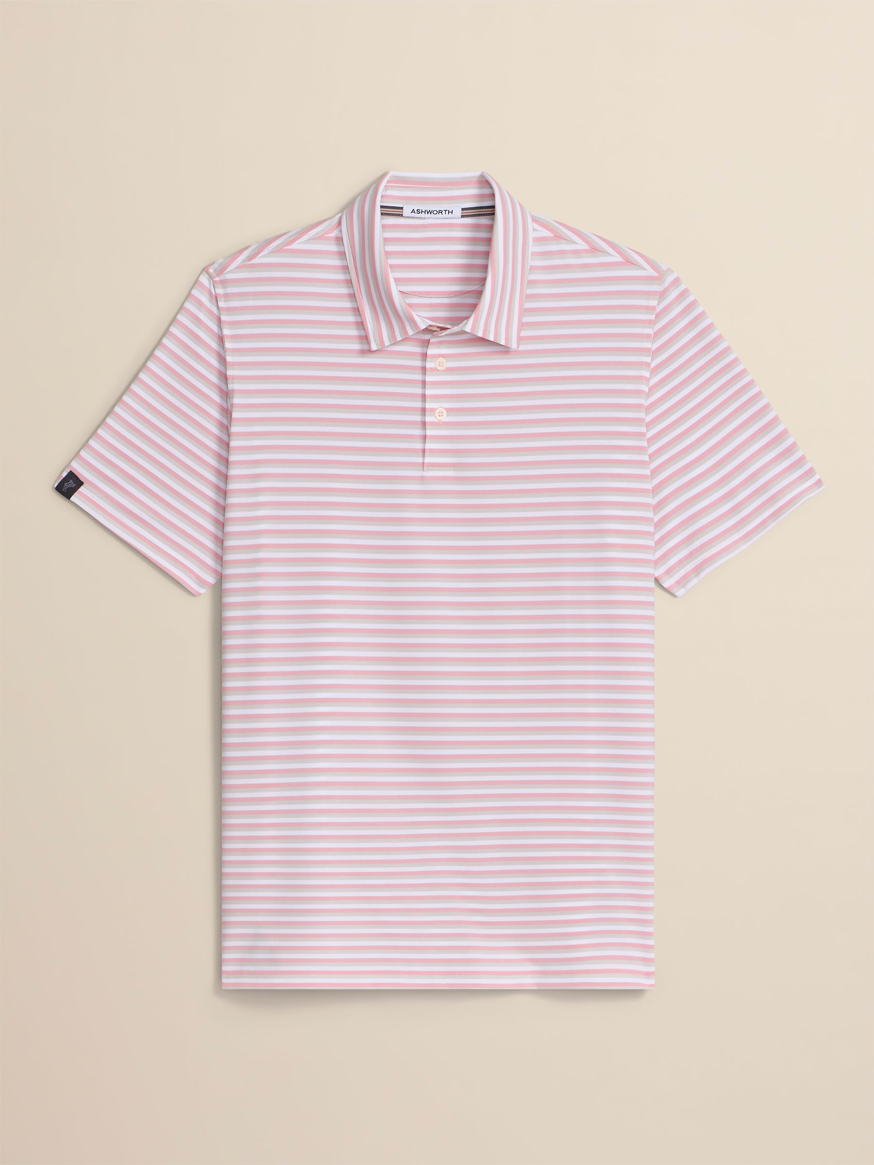 Pink and white striped polo shirt on a beige background