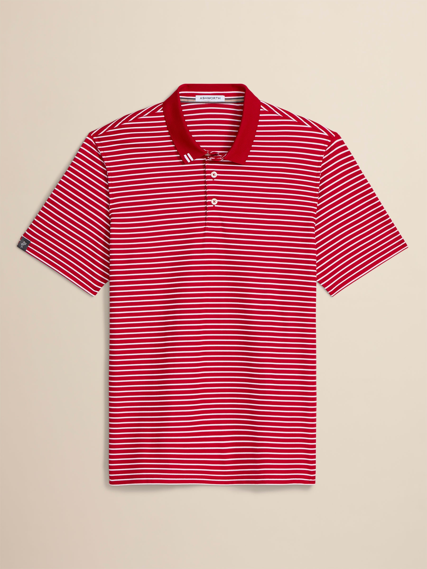 Red and white striped polo shirt on a beige background