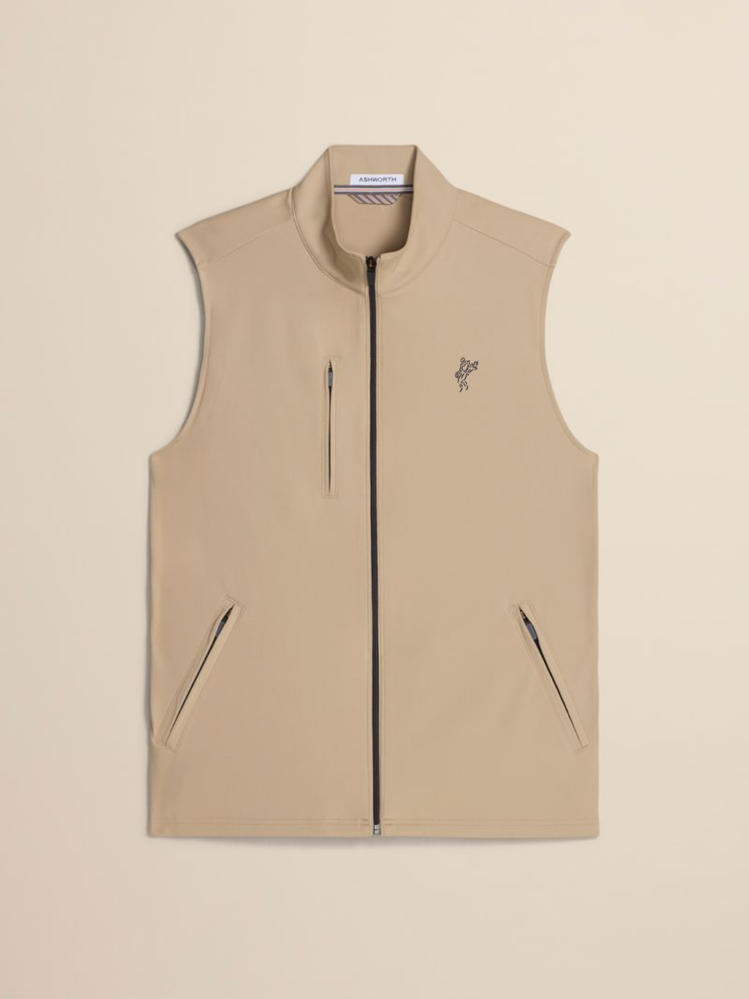 A beige sleeveless zip-front vest with a stand collar, two vertical zip pockets, and a small embroidered bird logo on the left chest, shown on a plain beige background.