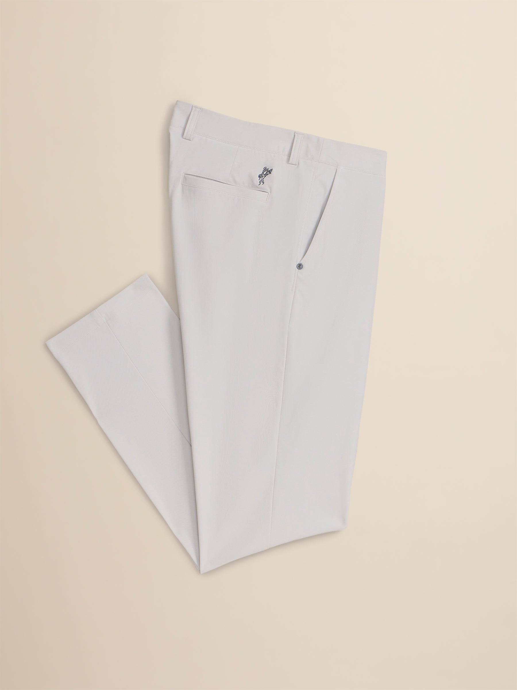 Light gray pants on a beige background