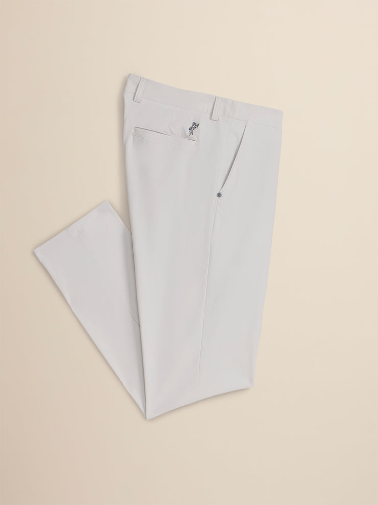 Light gray pants on a beige background