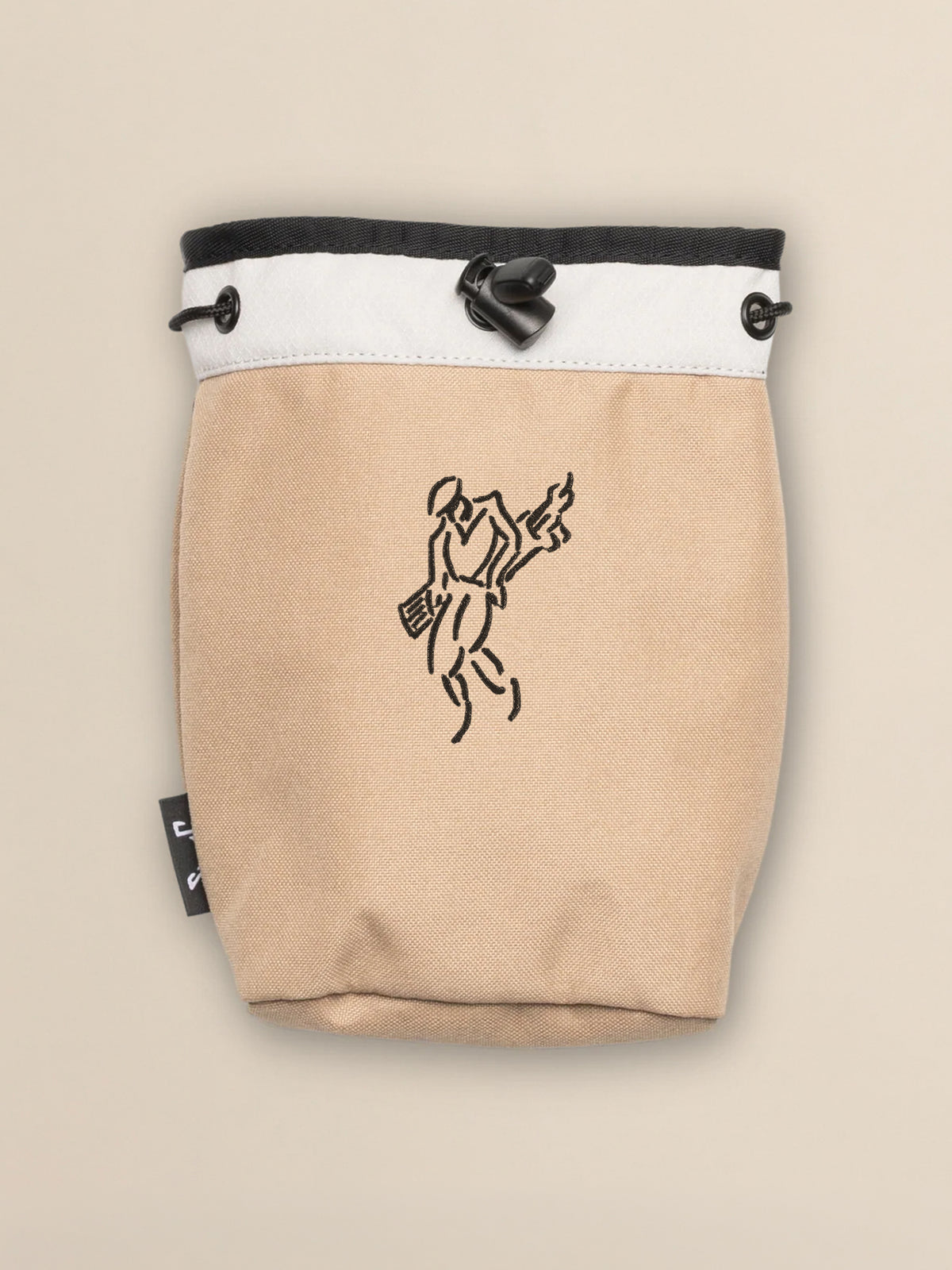 Beige pouch with black drawstring and logo on a beige background